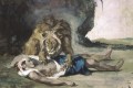 Löwe zerreißt auseinander eine Leiche